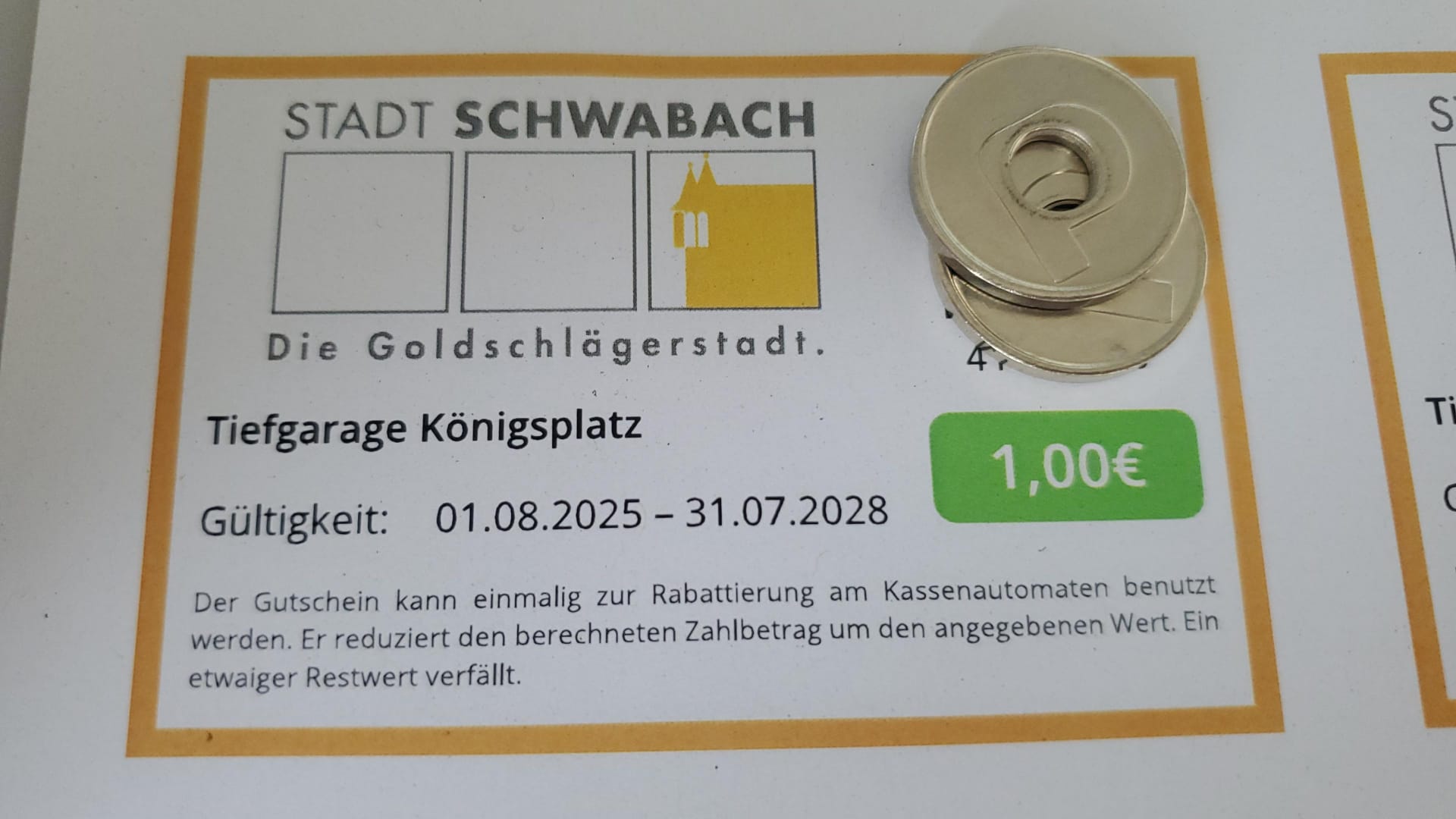 Zwei Wertmarken für die Tiefgarage